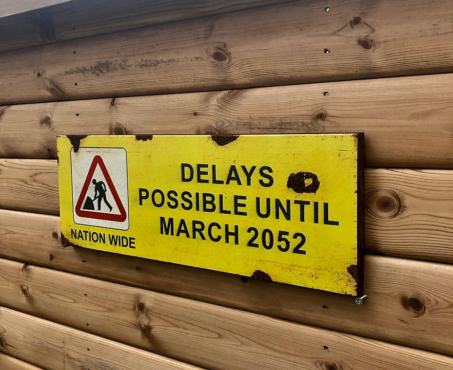 Delays-Possible-Until-March-2052-Vintage-Metal-Street-Sign-1.jpg